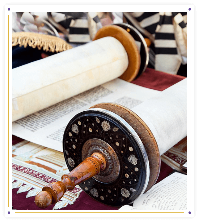 A torah scroll is shown with other scrolls.