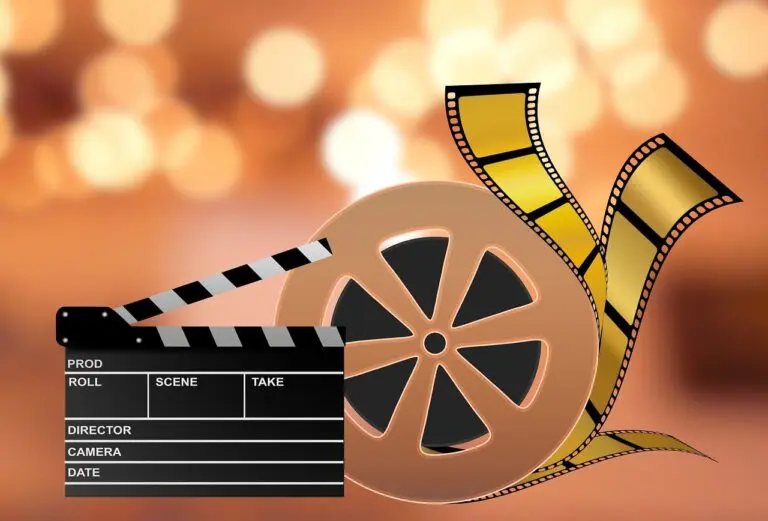 A film reel and some films on a blurry background